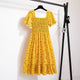 Thea smocked floral midi dress with flutter sleeves in mustard floral