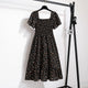 Thea smocked floral midi dress with flutter sleeves in black floral