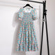Rosaria smocked floral midi dress with puff sleeves in sky blue rose