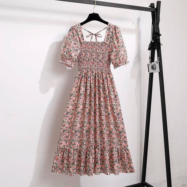 Rosaria smocked floral midi dress with puff sleeves in pink floral