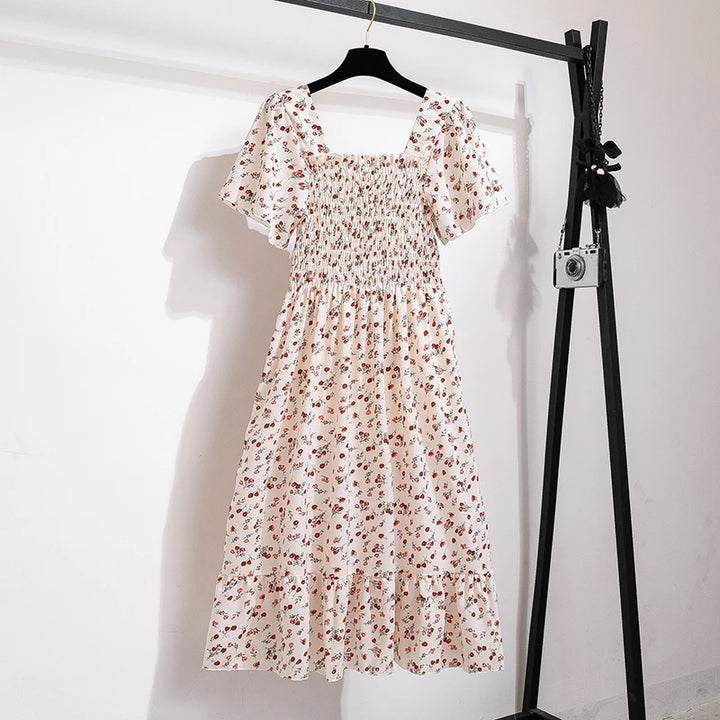 Thea smocked floral midi dress with flutter sleeves in cream floral