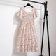 Thea smocked floral midi dress with flutter sleeves in cream floral