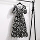 Rosaria smocked floral midi dress with puff sleeves in black daisy