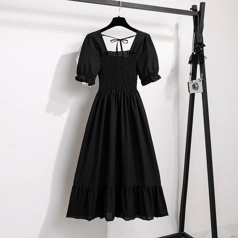 Rosaria smocked floral midi dress with puff sleeves in black