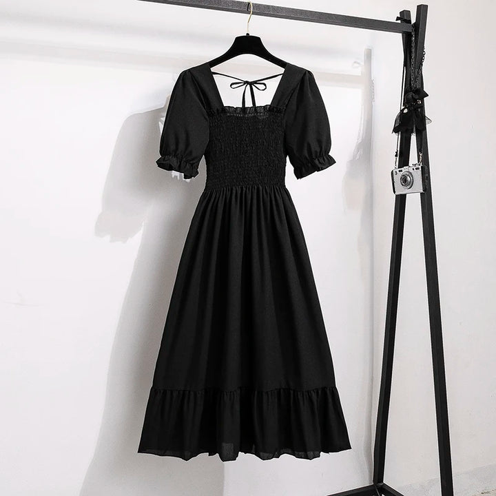 Rosaria smocked floral midi dress with puff sleeves in black